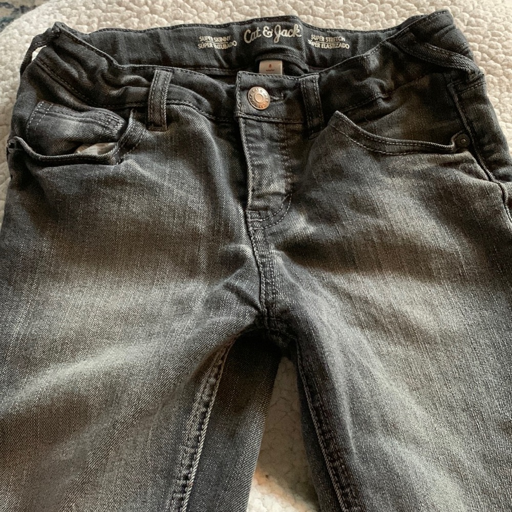 EUC Black Denim with ruffle slit detail jeans